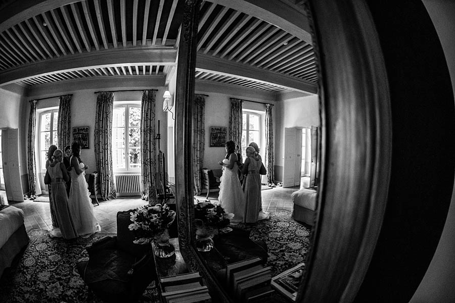 bride in a window of masion ducasse