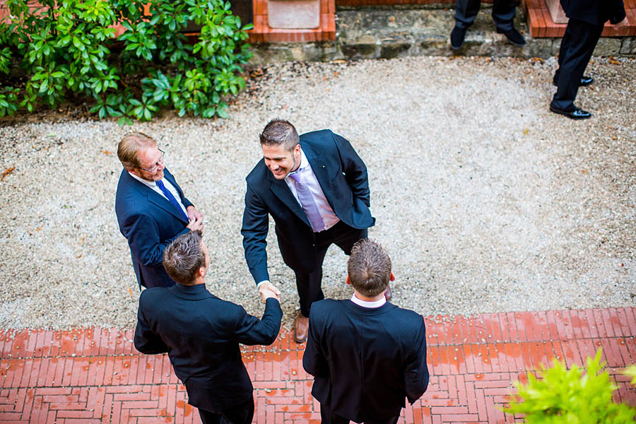 groomsmen outside in la celle abbaye